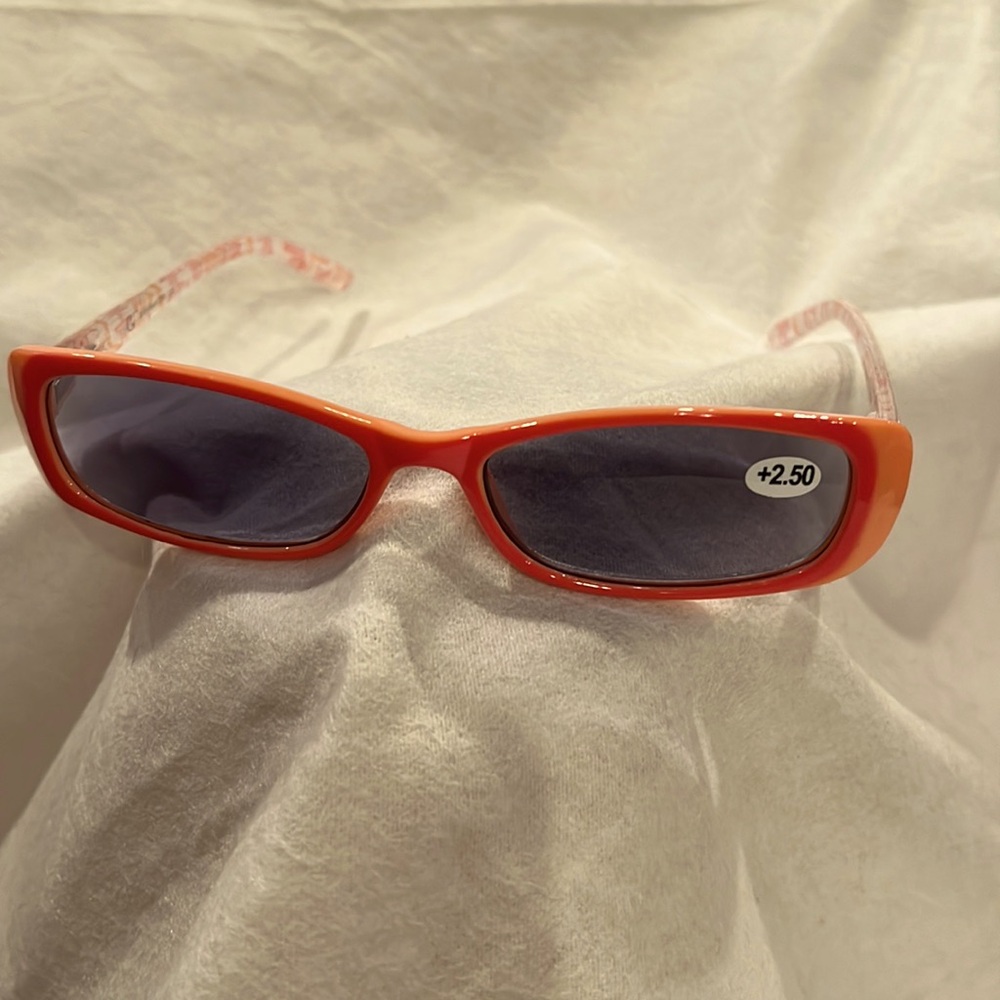 Sunglasses, readers 2.50